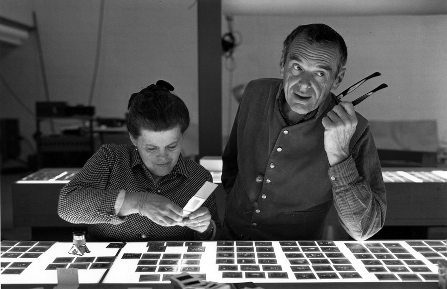 Ray and Charles Eames selecting slides for the exhibition, Photography & the City, 1968, as seen in Jason Cohn and Bill Jerseyâs documentary EAMES: The Architect and the Painter. Â© 2011 Eames Office, LLC.